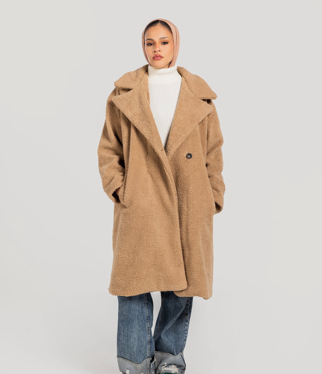 Beige poodle coat