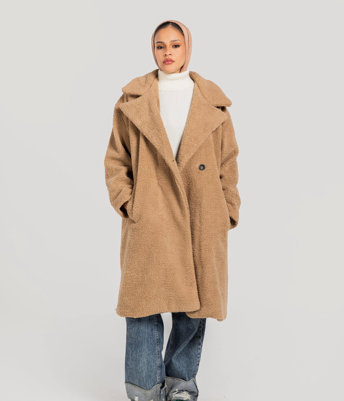 Beige poodle coat
