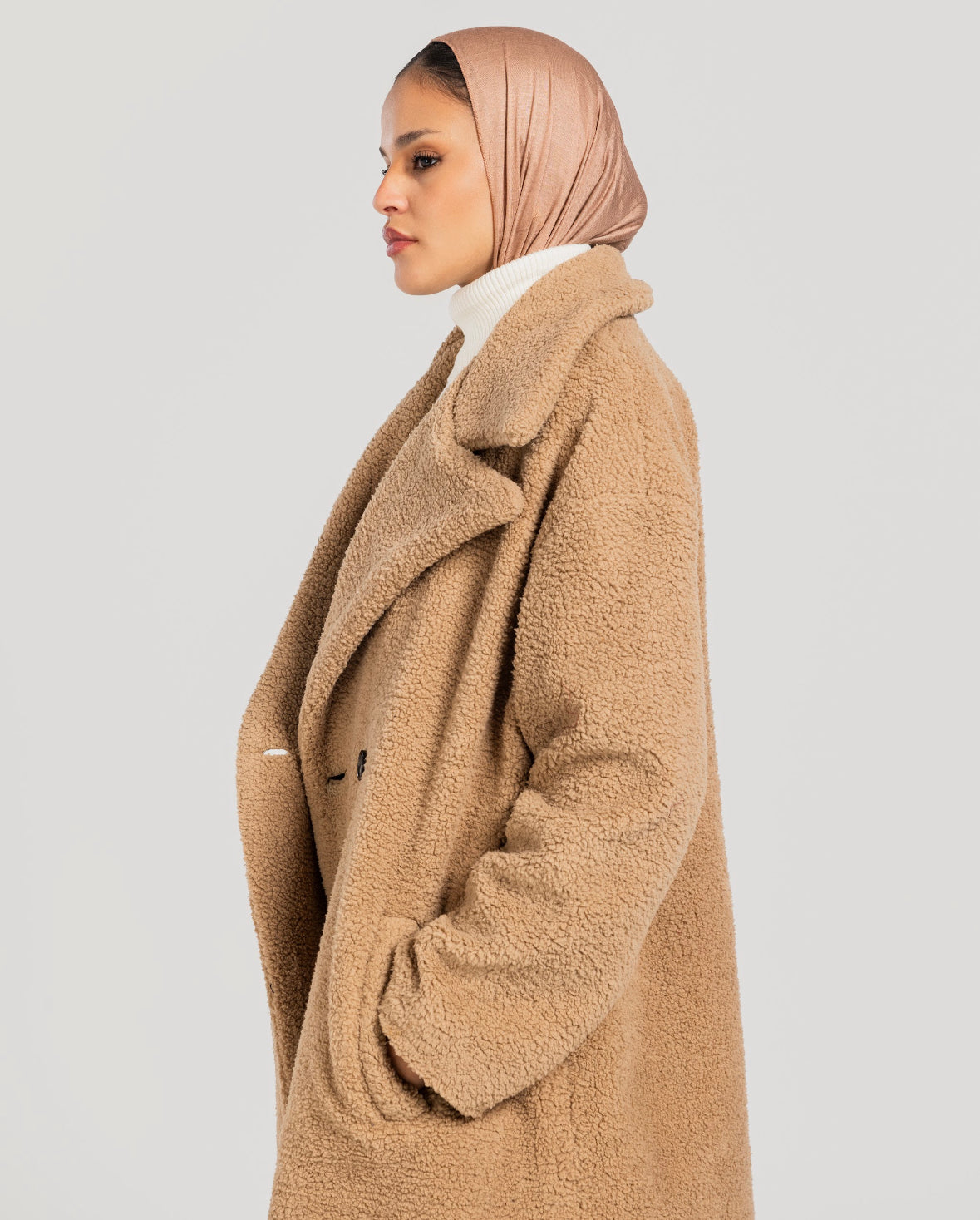Beige poodle coat